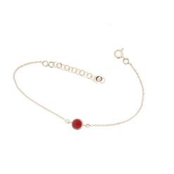 Bracelet argent doré motif rond avec corail rouge.