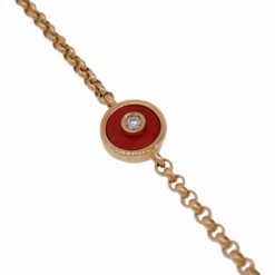 Bracelet rond en or jaune, corail rouge et diamant.