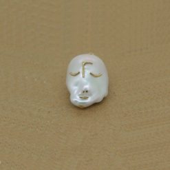 Pendentif perle d'eau douce baroquée au visage d'or jaune 18k