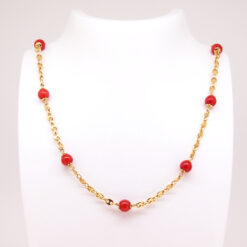 Chaine grain café or jaune et 10 perles corail 7mm